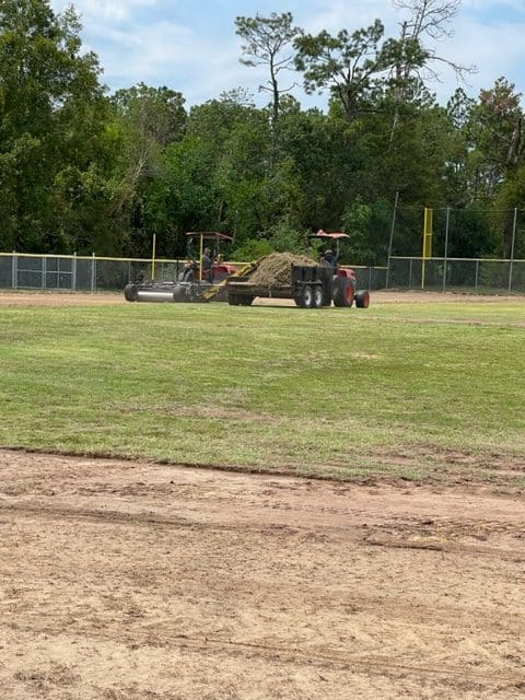 Removing the sod off of Field 11 like a rice harvest