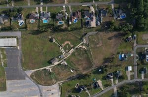 Drone footage of western side of Main complex with neighborhood